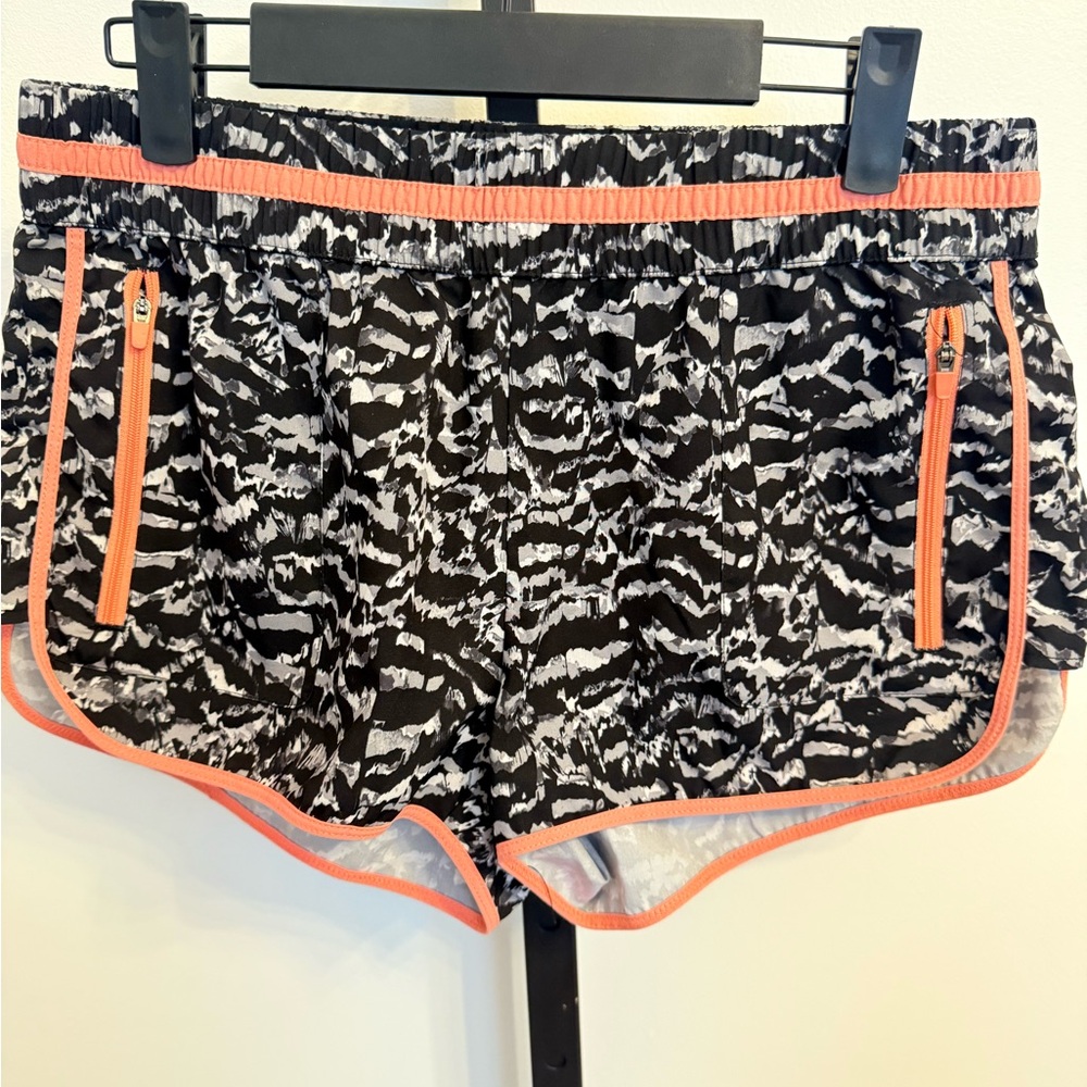 Fabletics Black and White Athletic Shorts with Orange Trim Size Small